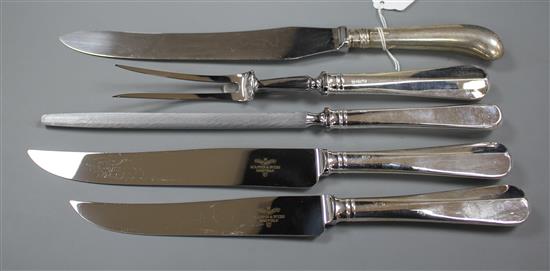 A modern 4 piece silver handled carving set and one hundred and forty three items of plated flatware